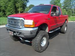 Red Pick Up Truck Lifted